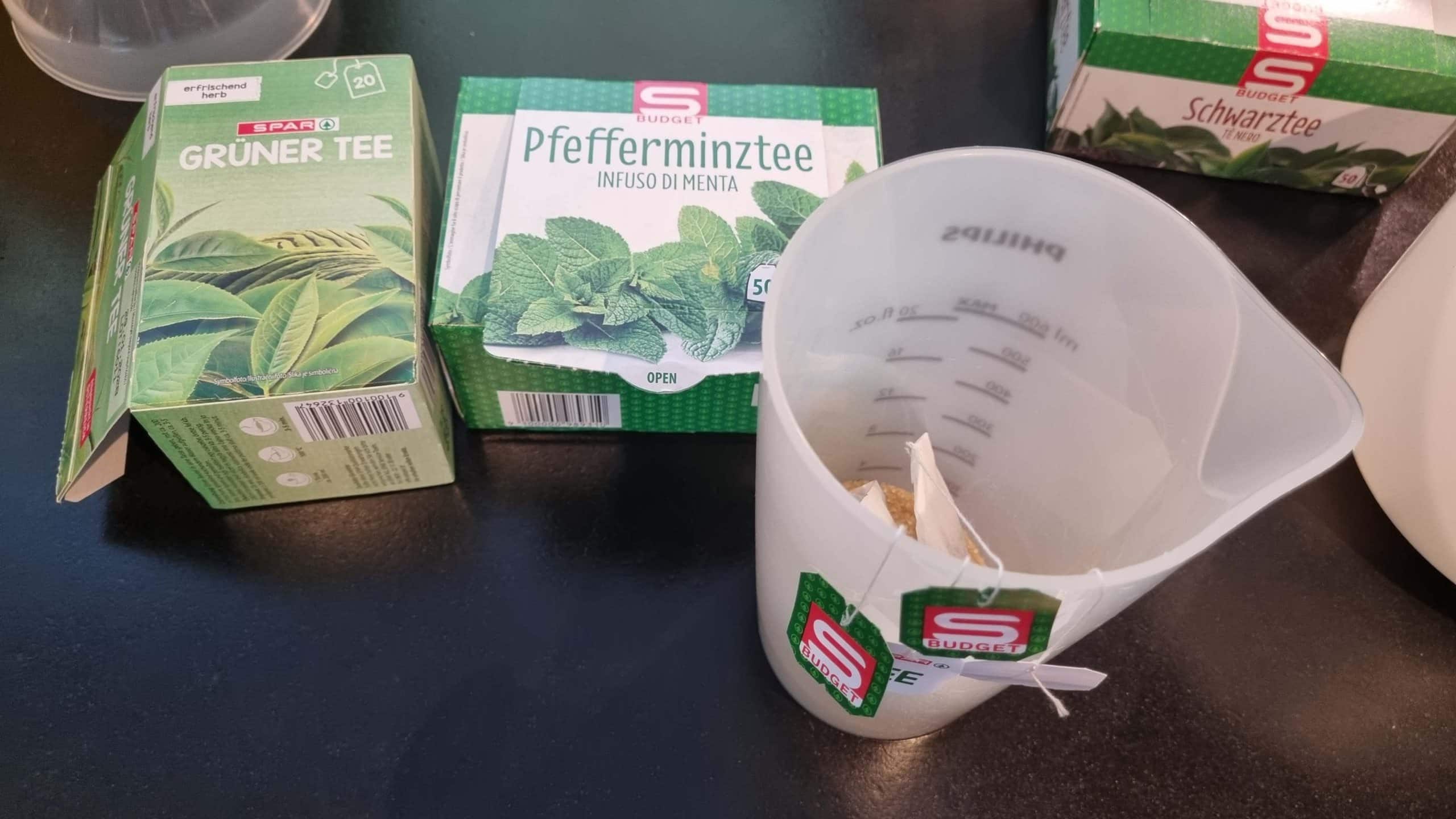 Preparing tea bags and sugar for homemade kombucha recipe