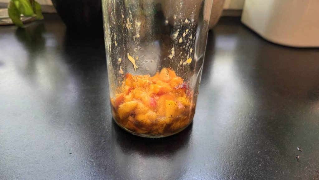 Nectarine and vanilla powder filled into flip top bottle